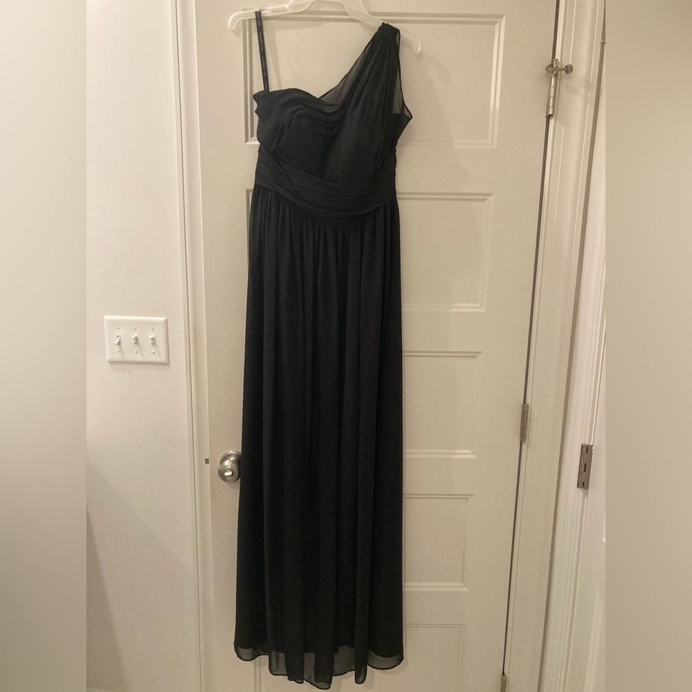 No stretch material. Only worn for a few hours and has since been dry cleaned.